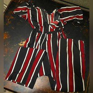Red white and back jump suit